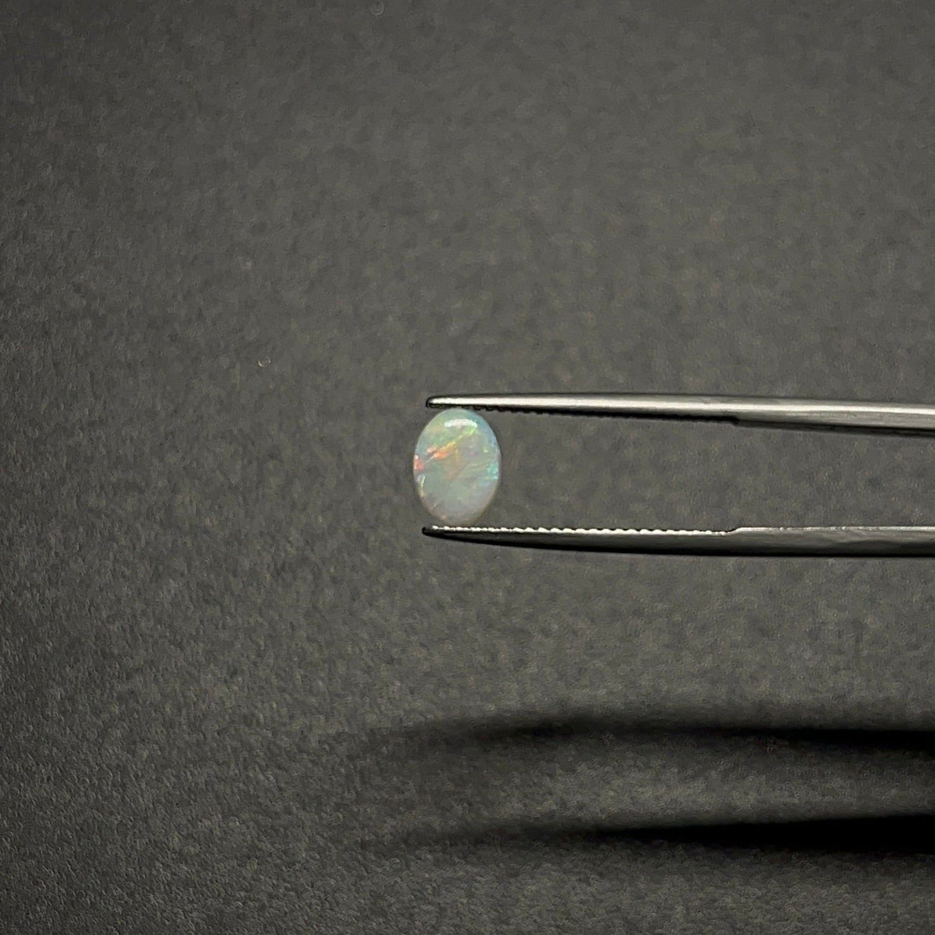 Australian Opal Cabochon 8.1x6 mm
