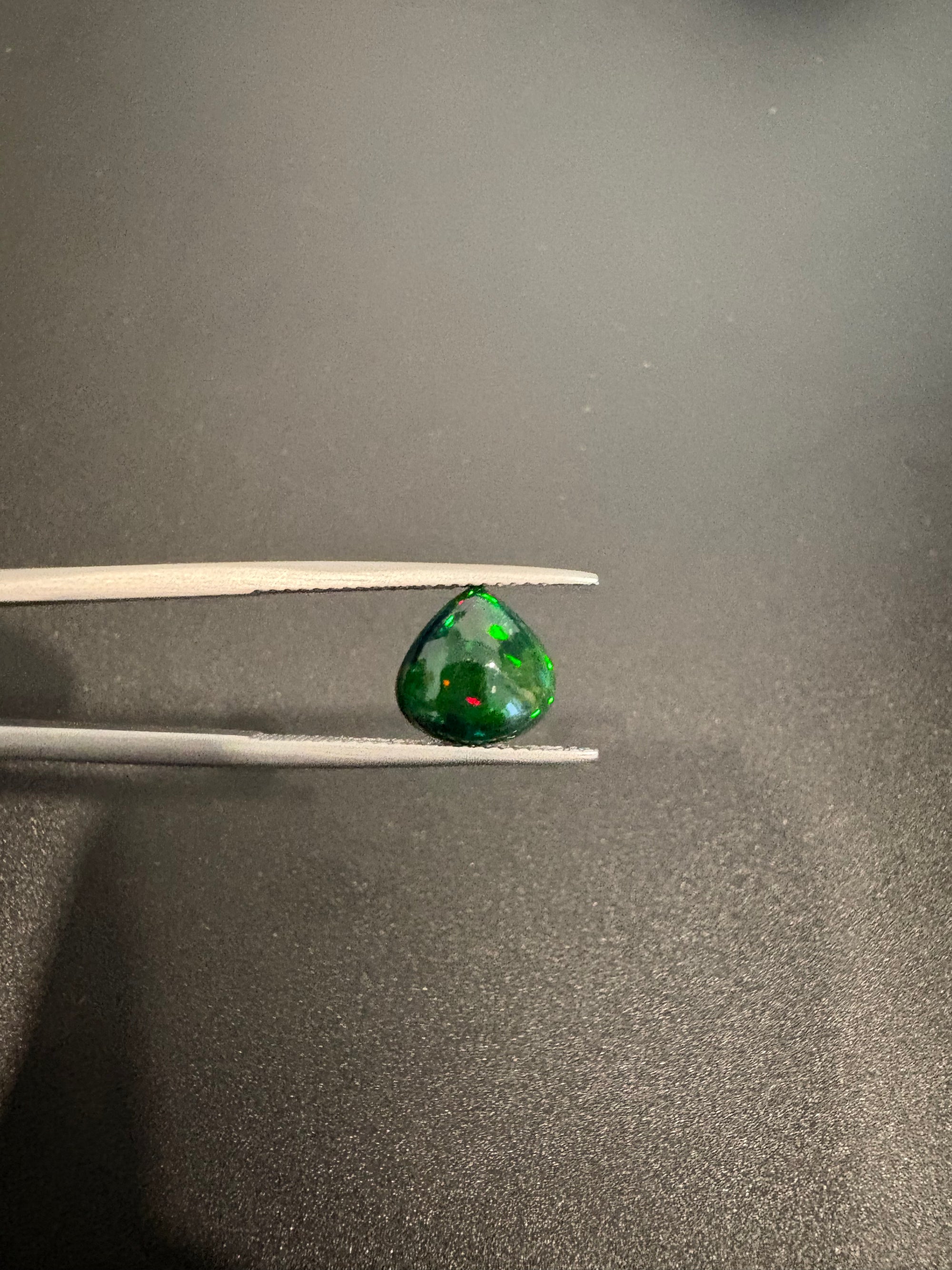 Black opal 9x9mm approximately 1.65 carat (GTG-BOP-64)