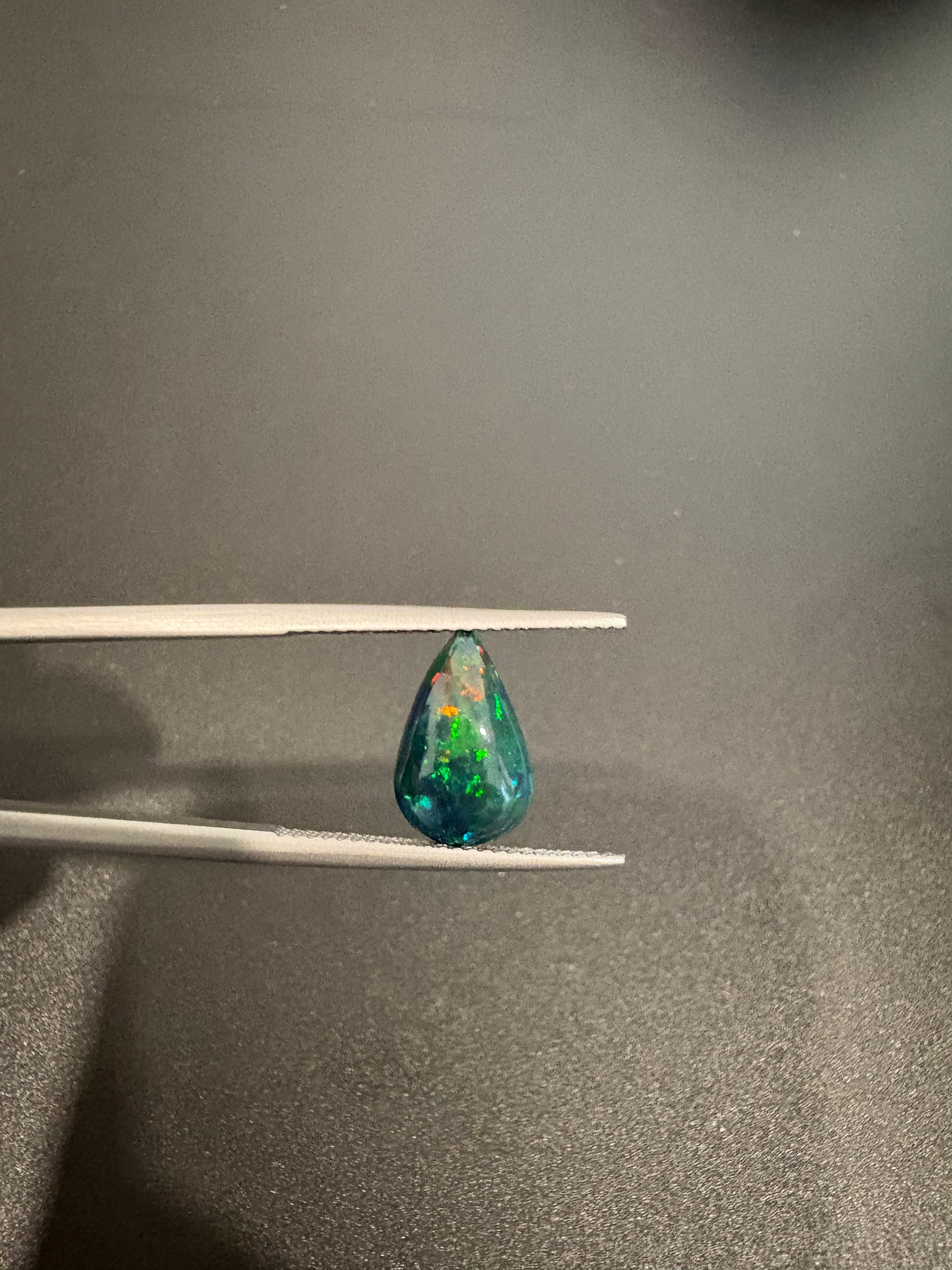 Black Opal teardrop shape 13x8mm approximately 2 carat (GTG-BOP-63)
