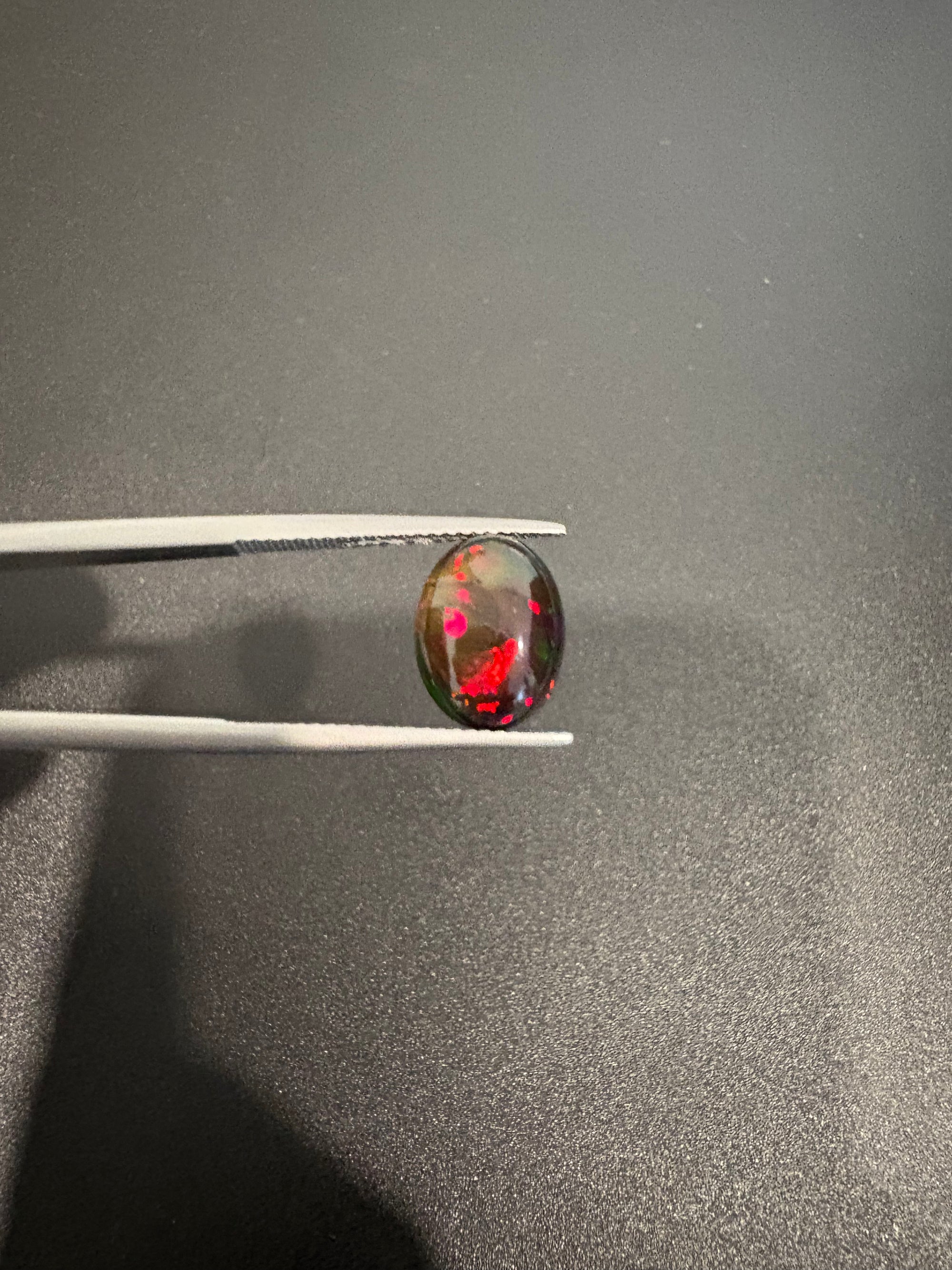 Black Opal oval shape 12x9mm approximately 2.60 carat (GTG-BOP-60)