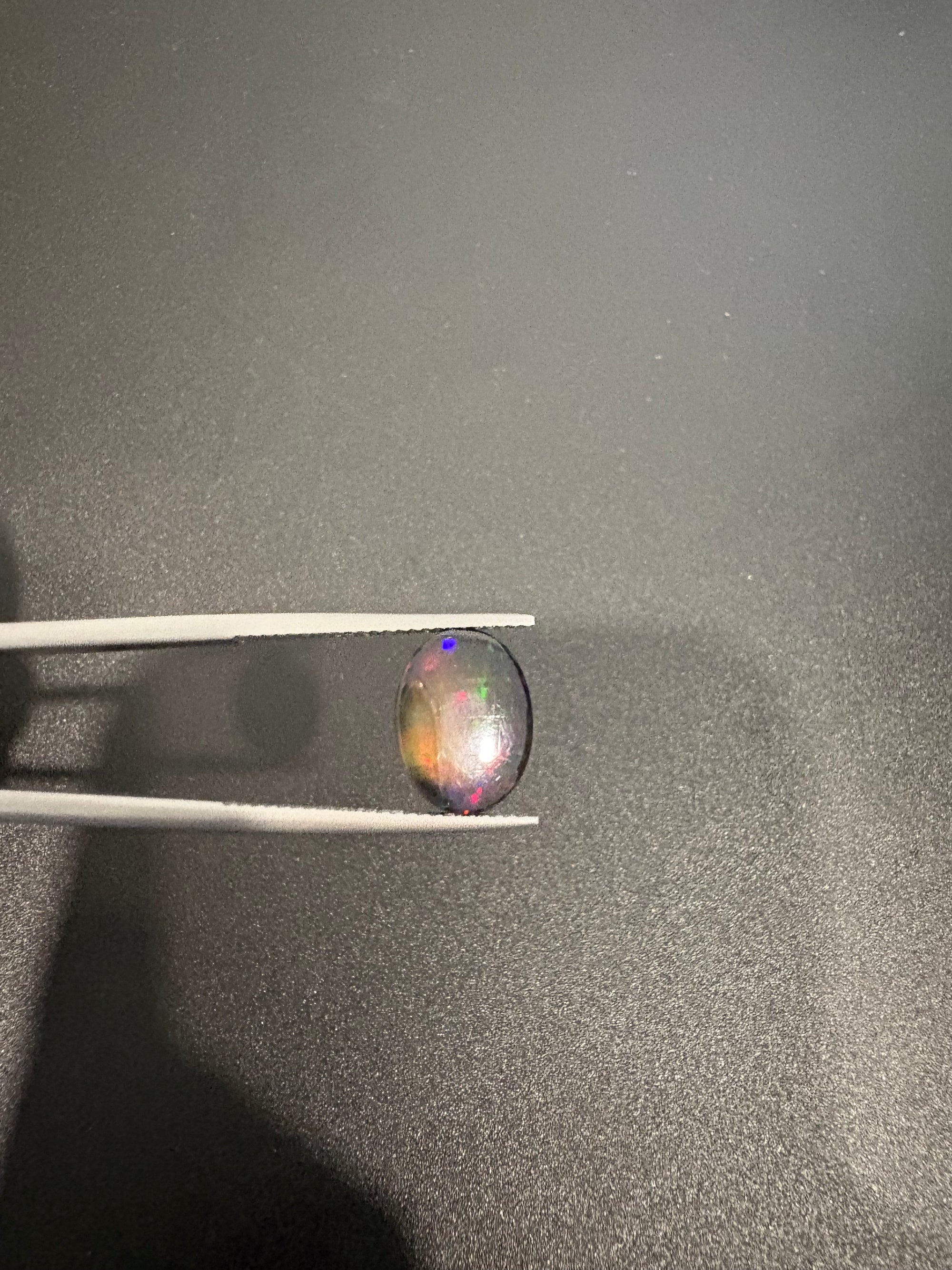 Black Opal oval shape 12x9mm approximately 2.60 carat (GTG-BOP-60)