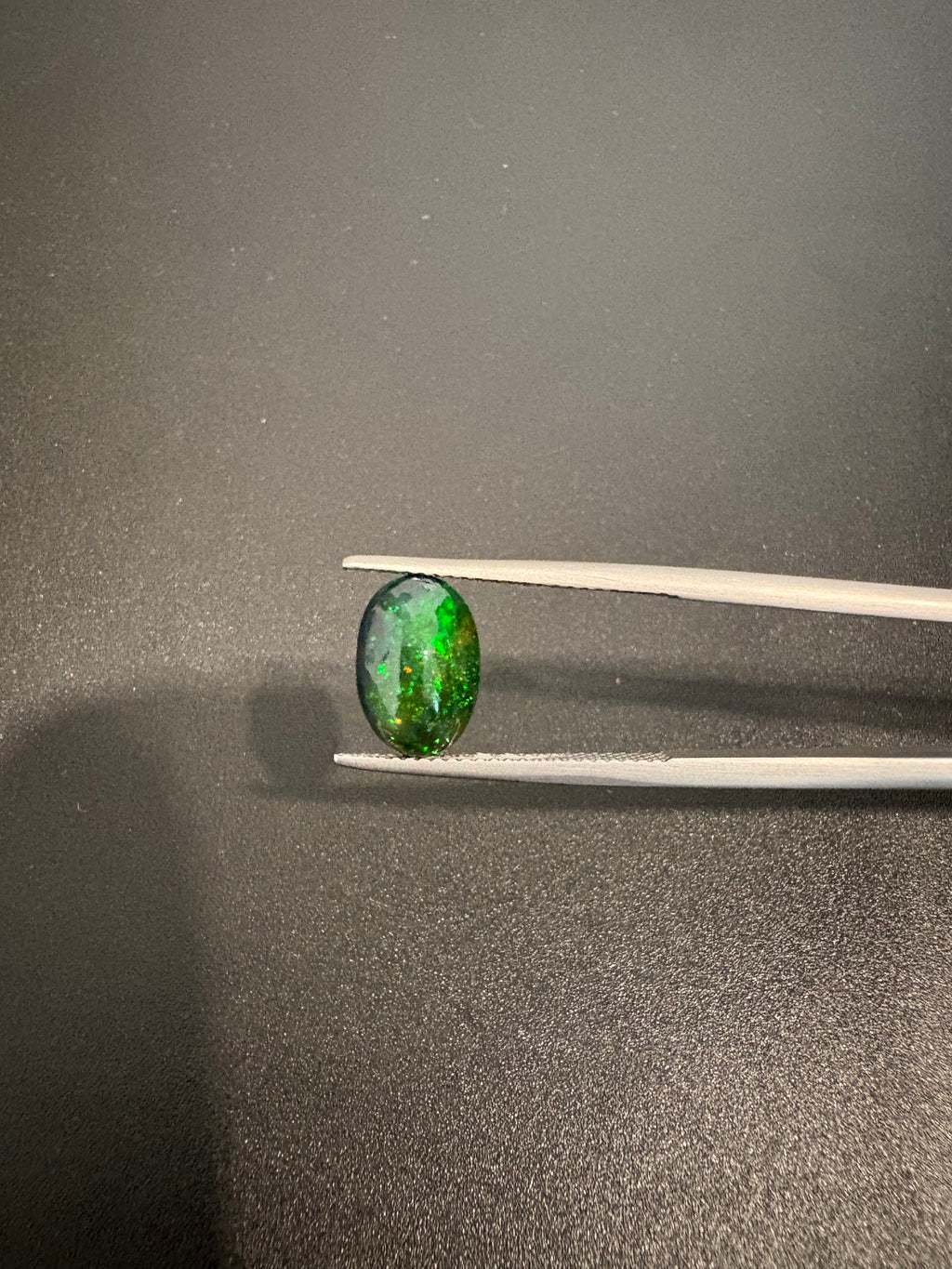 Black Opal oval shape 11x7.5 mm approximately 2.15 carat (GTG-BOP-59)