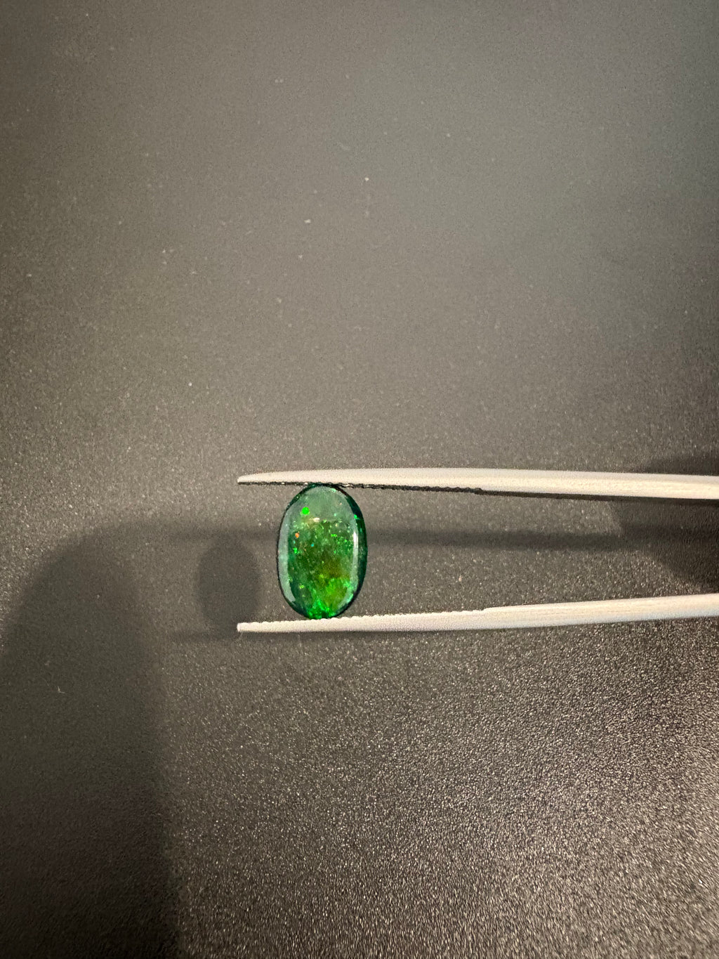 Black Opal oval shape 11x7.5 mm approximately 2.15 carat (GTG-BOP-59)