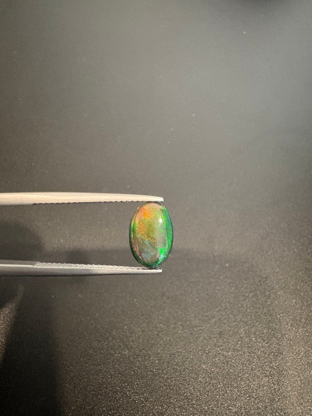 Ethiopian Black opal 11x7mm oval shape approximately 1.08 carat (GTG-BOP-58)