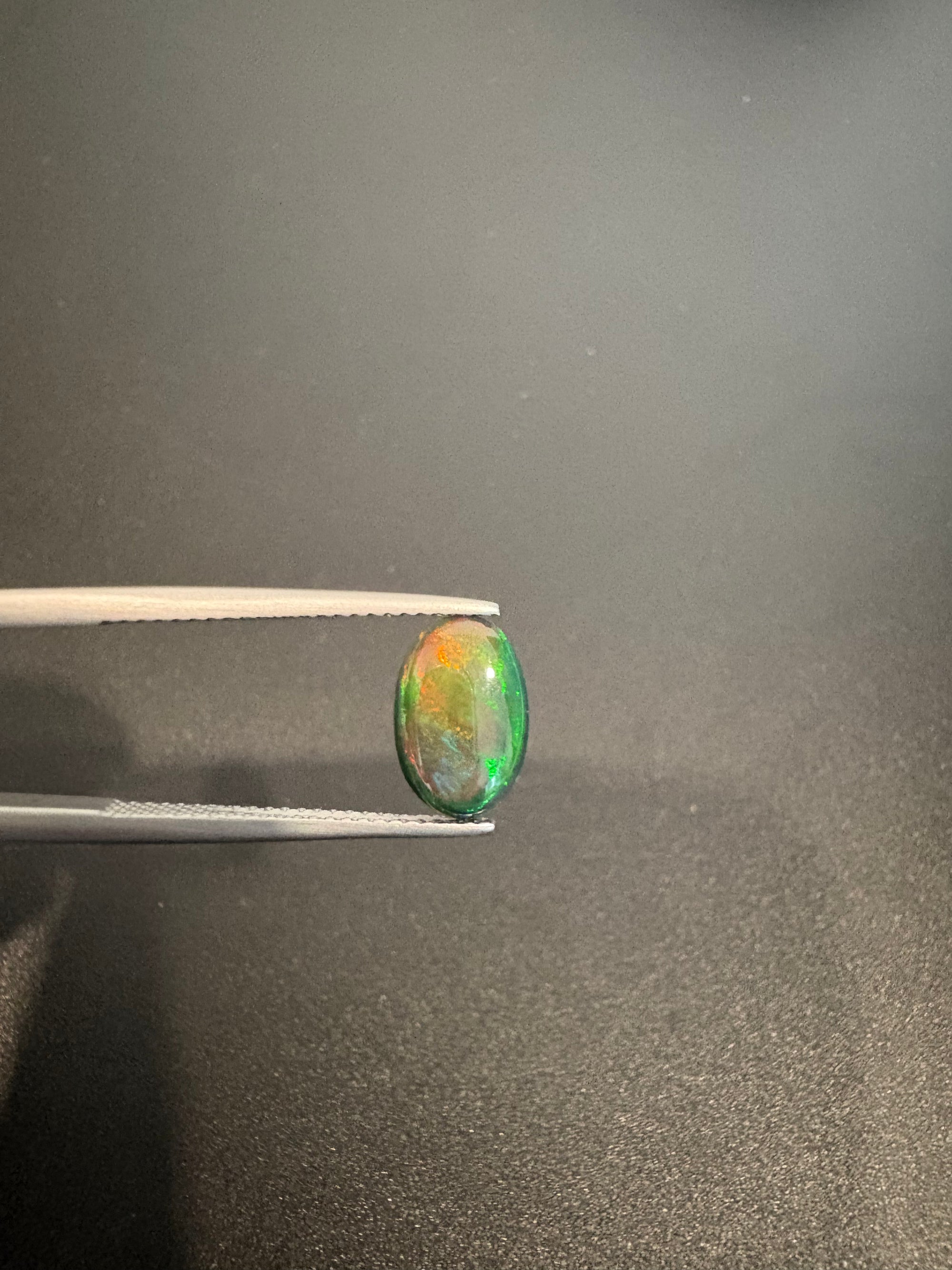 Ethiopian Black opal 11x7mm oval shape approximately 1.08 carat (GTG-BOP-58)