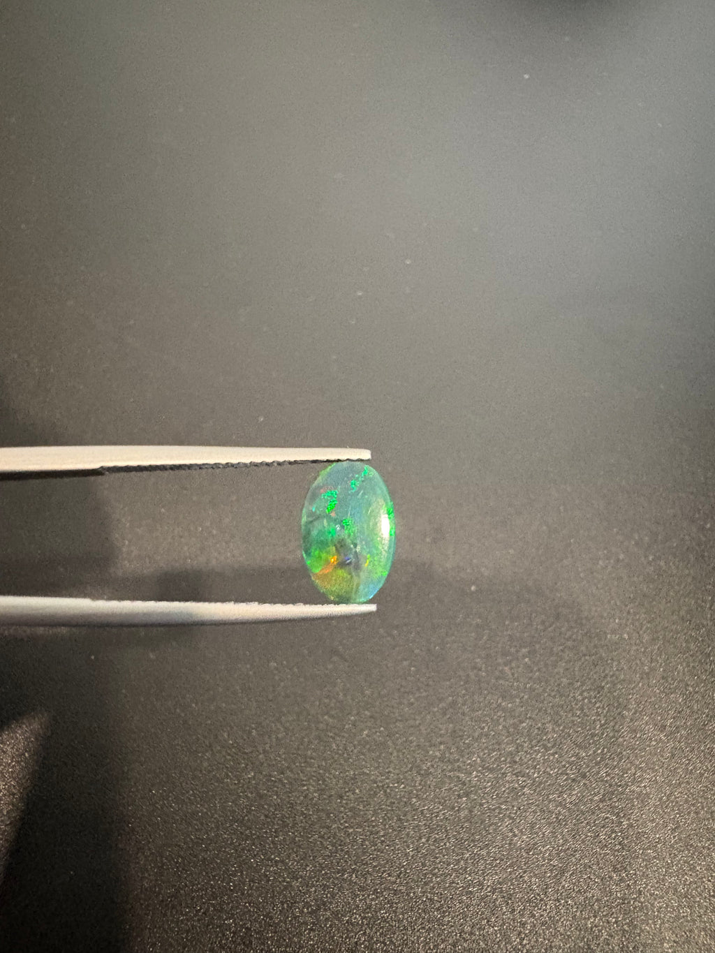 Ethiopian Black opal 11x7mm oval shape approximately 1.08 carat (GTG-BOP-58)
