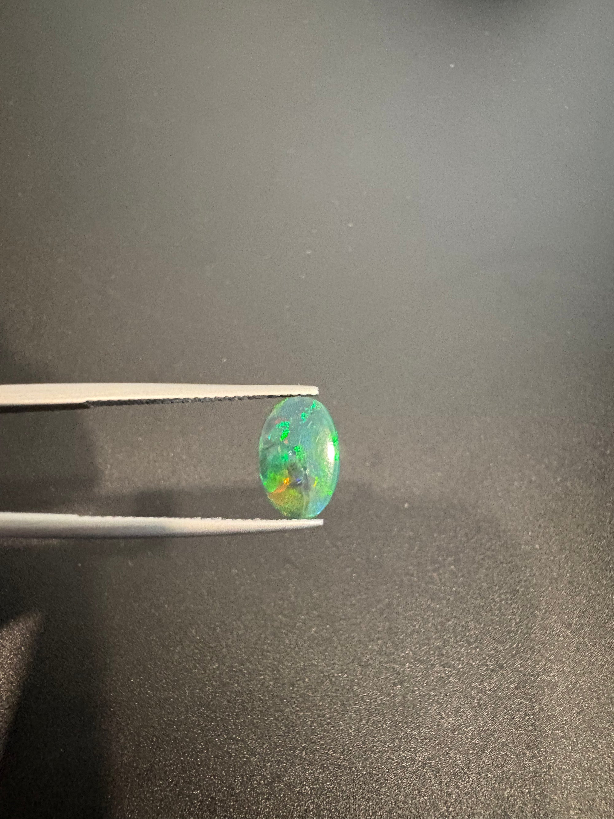 Ethiopian Black opal 11x7mm oval shape approximately 1.08 carat (GTG-BOP-58)