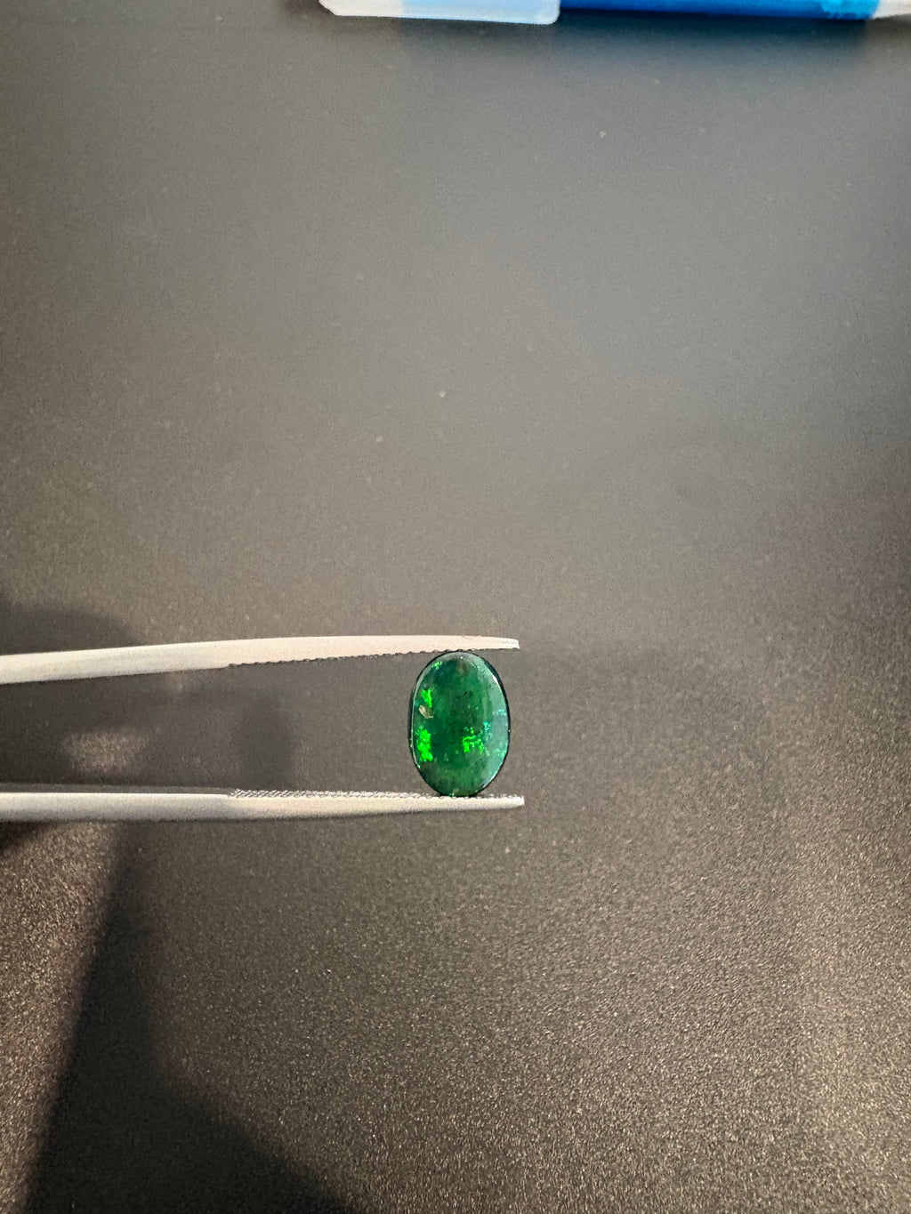 Black Opal oval shape 10x7mm approximately 1.30 carat (GTG-BOP-50)