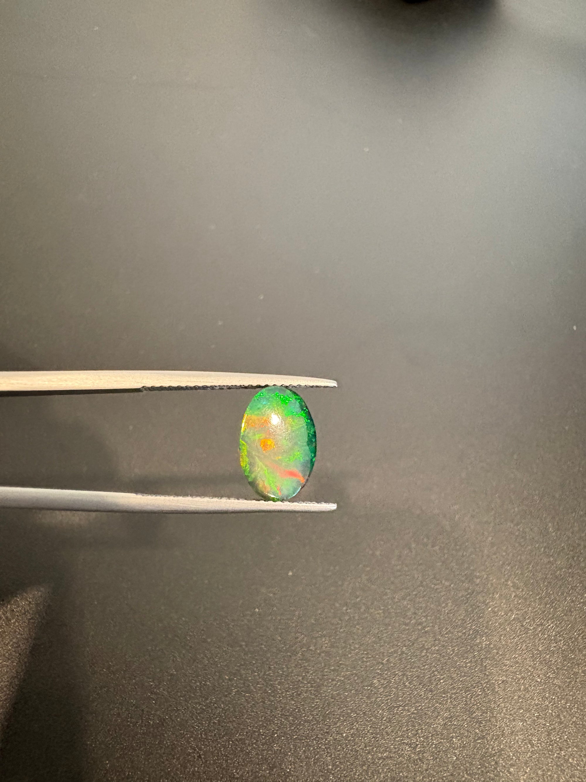 Black Opal oval shape 10x8mm approximately 3 carat (GTG-BOP-7)