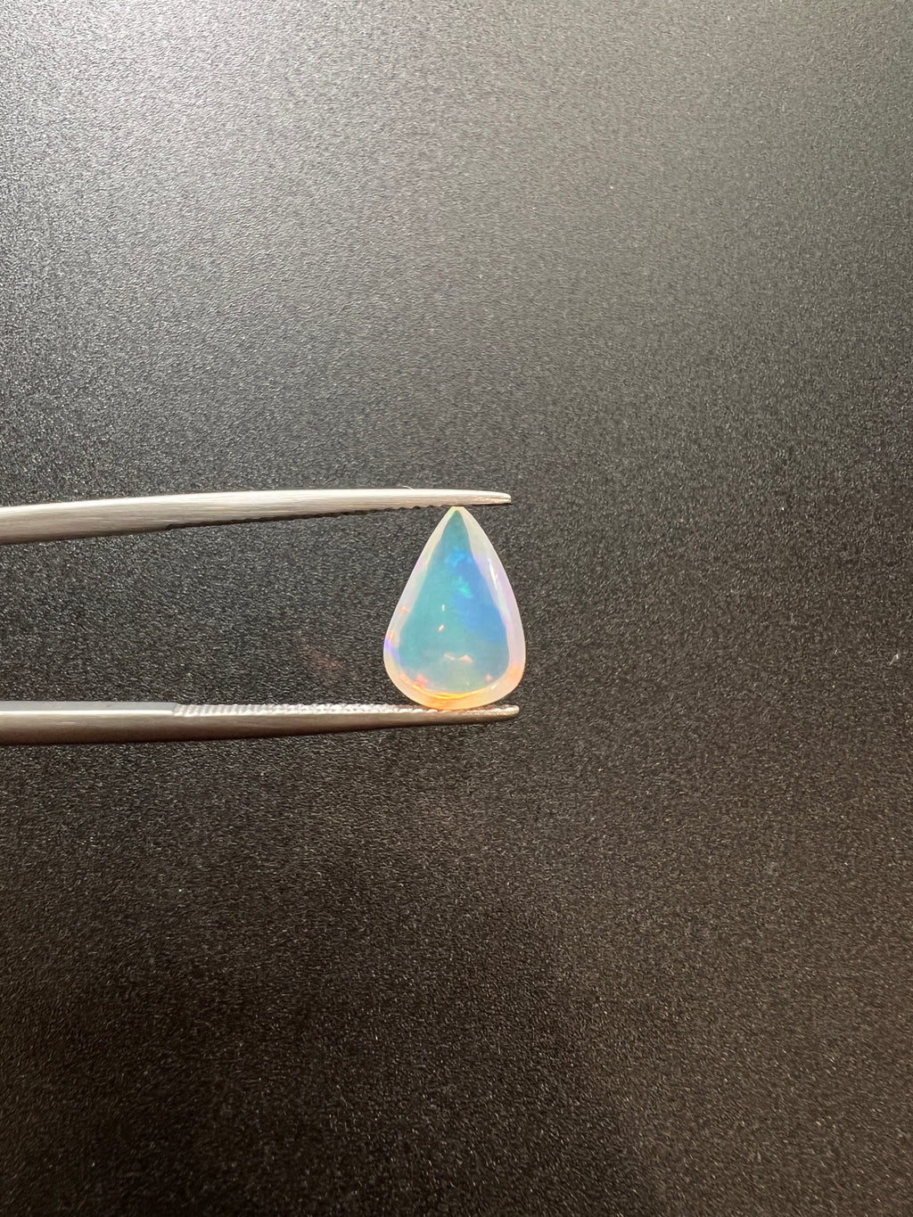 Ethiopian Opal teardrop 11x7mm approximately 1.60 carat, 1 pcs (GTG-OP-5)