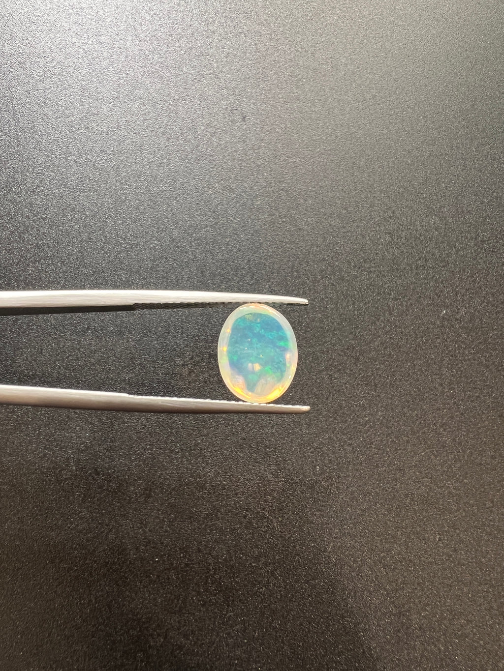 Ethiopian Opal 11x9 mm cabochon approximately 2.30 carat (GTG-OP-123)