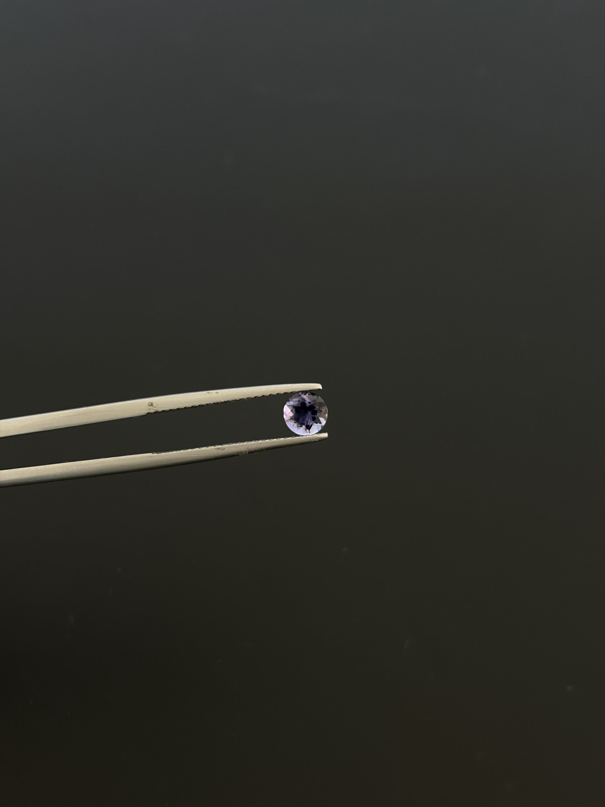 Iolite Faceted Gemstone Round 5 mm, Approximately 1.95 Carat