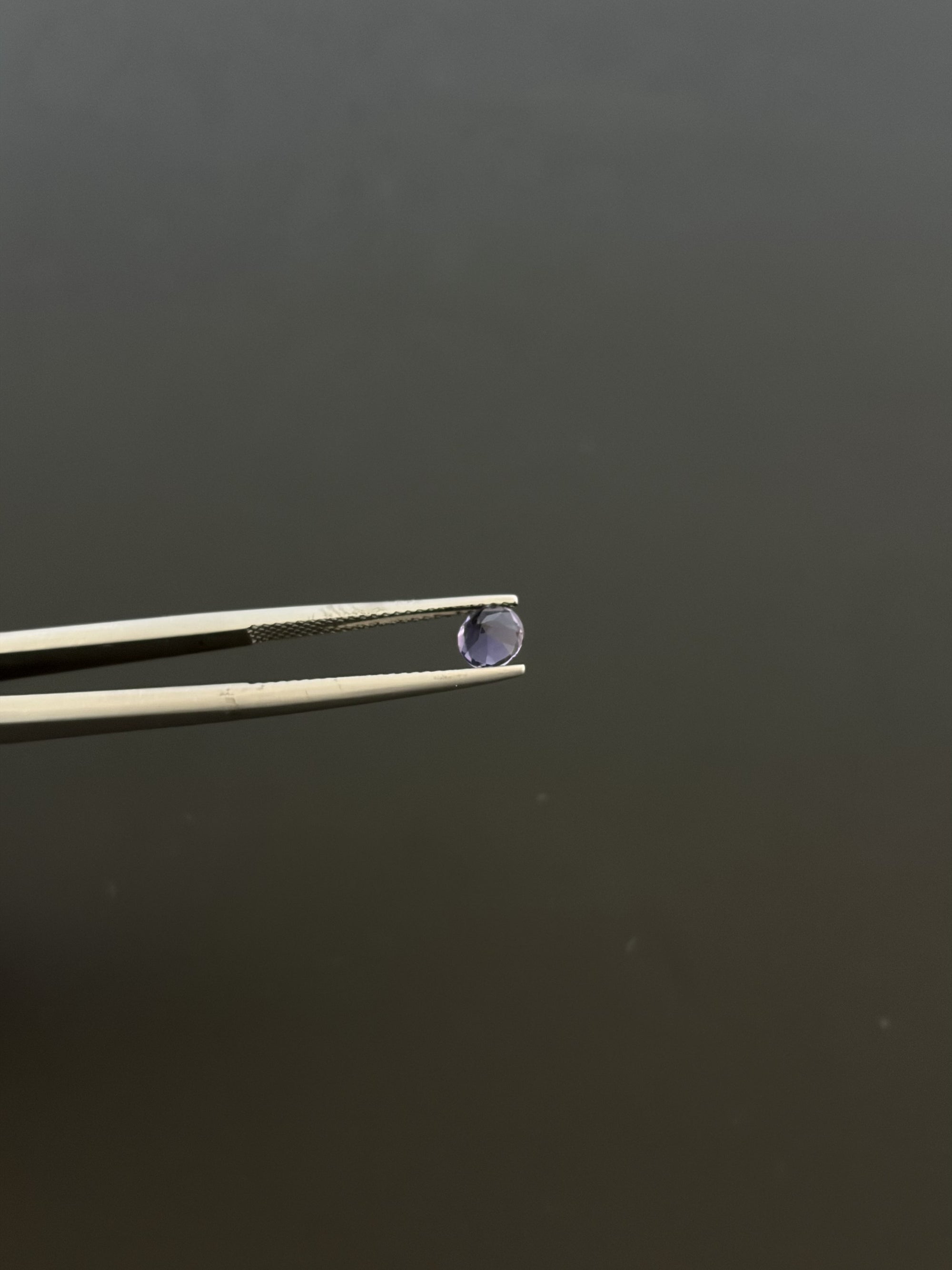 Iolite Faceted Gemstone Round 5 mm, Approximately 1.95 Carat