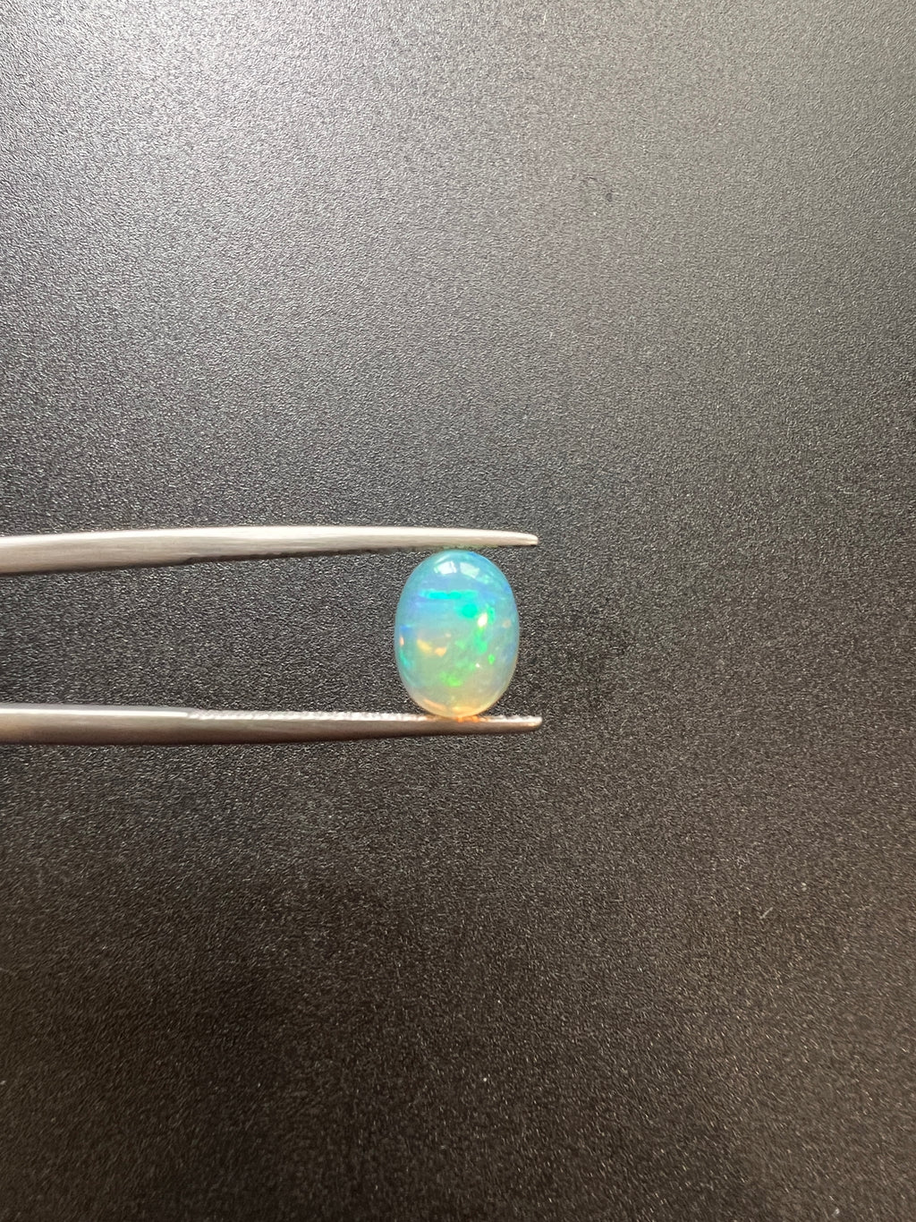 Ethiopian Opal oval shape 10x7mm approximately 1.50 carat (GTG-OP-119)