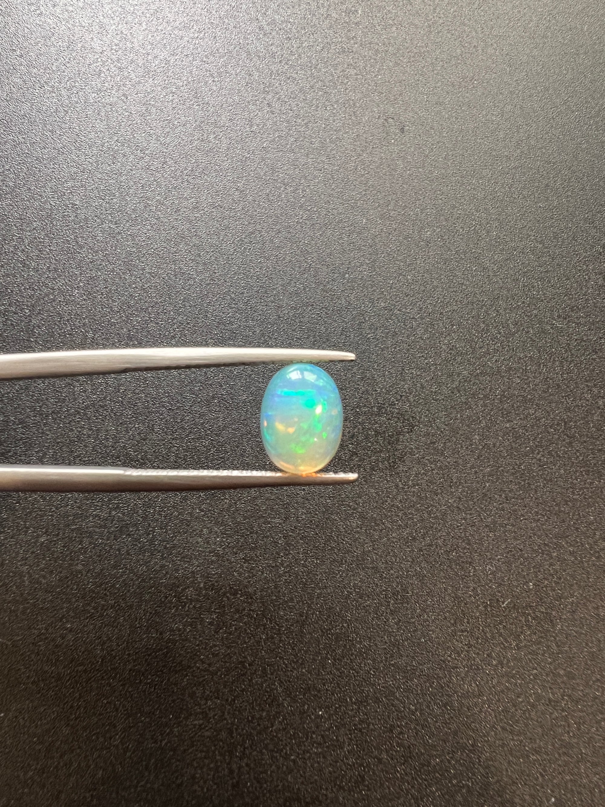 Ethiopian Opal oval shape 10x7mm approximately 1.50 carat (GTG-OP-119)