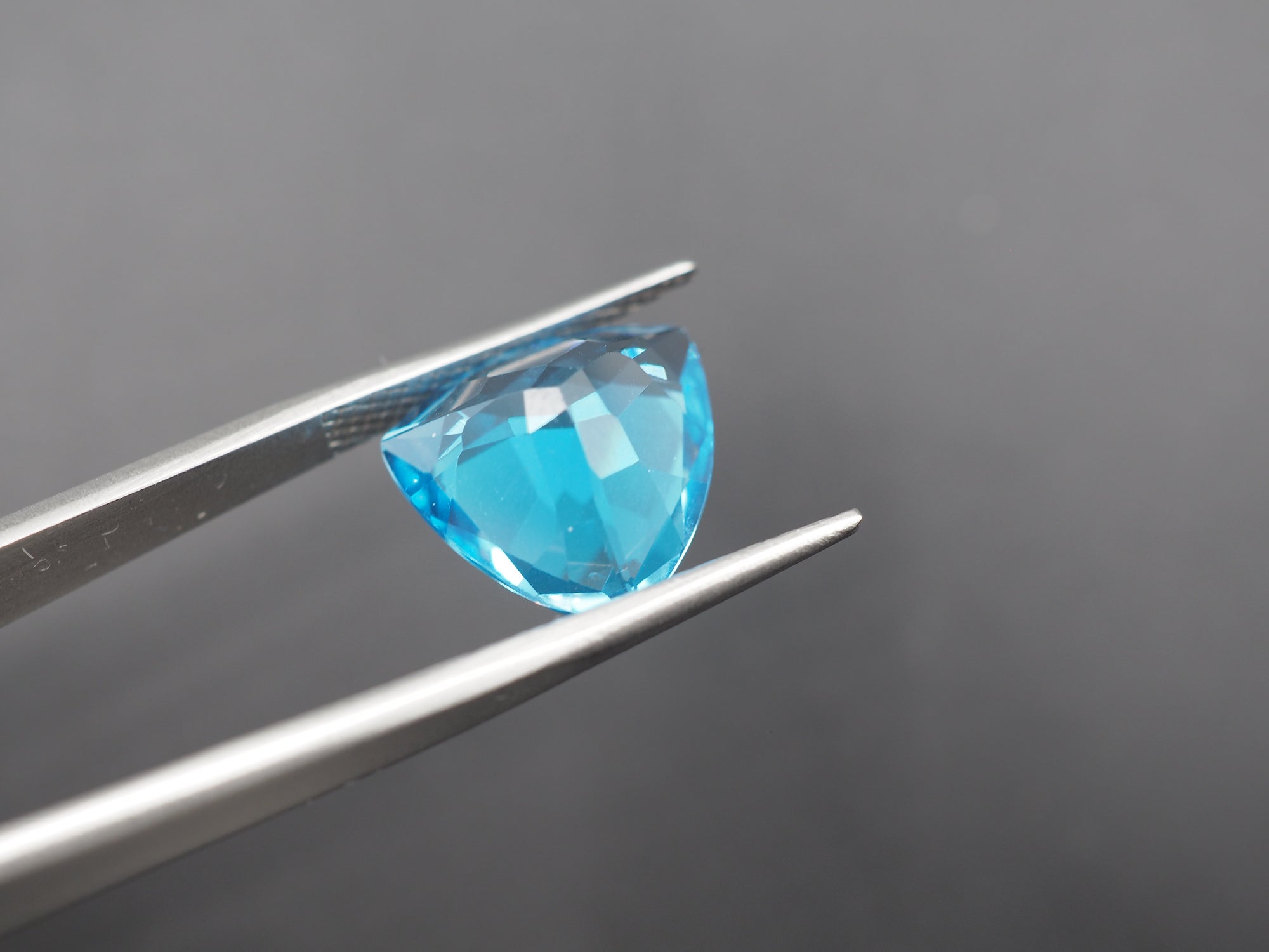 Swiss Blue Topaz AAA+ Faceted Gemstone, Trillion Shape 13.9x13.9 mm