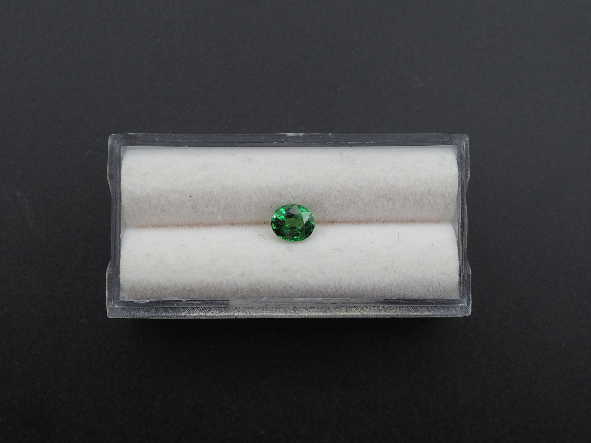 Tsavorite Faceted Oval Shape 6.0 x 5.0 x 3.3 Single Piece Approximately 0.74 Carat