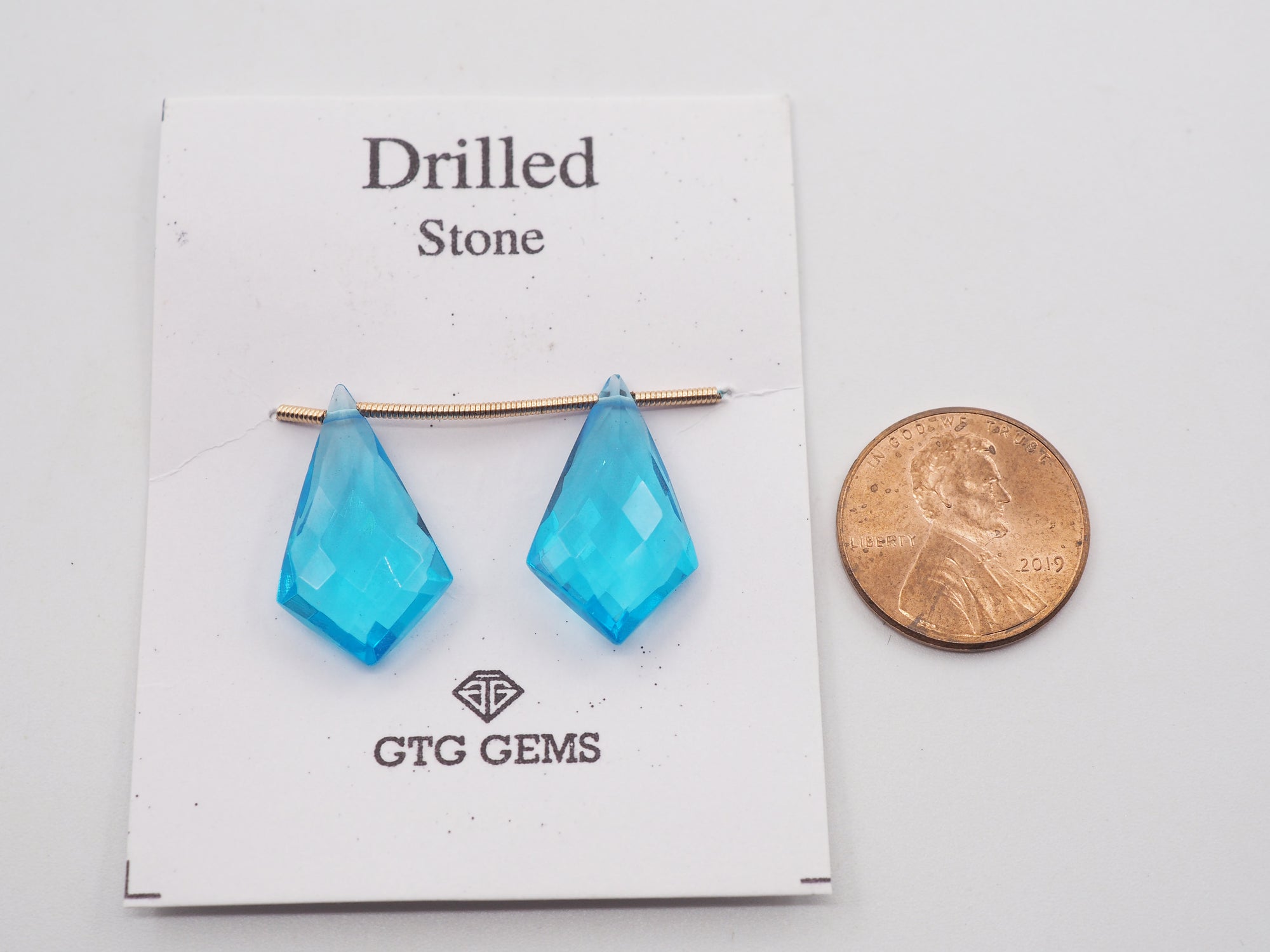 Hydro Drilled Faceted Blue Topaz Shield Shape  Approximately 13.5 Carat