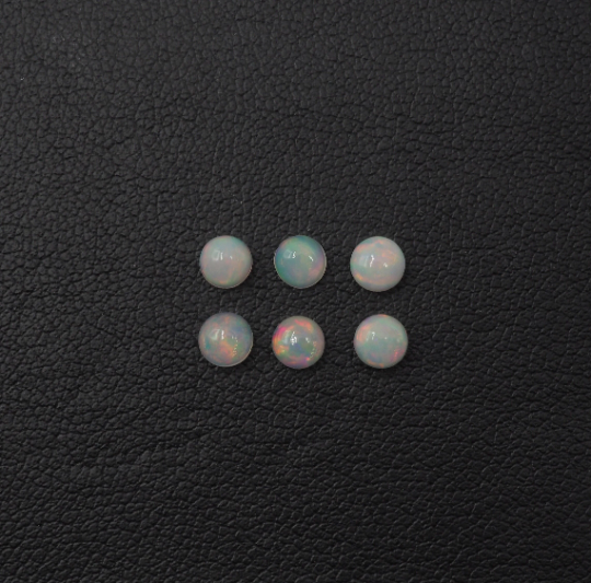 Ethiopian Opal Round cabs 4mm Approximately 1.14 Carat