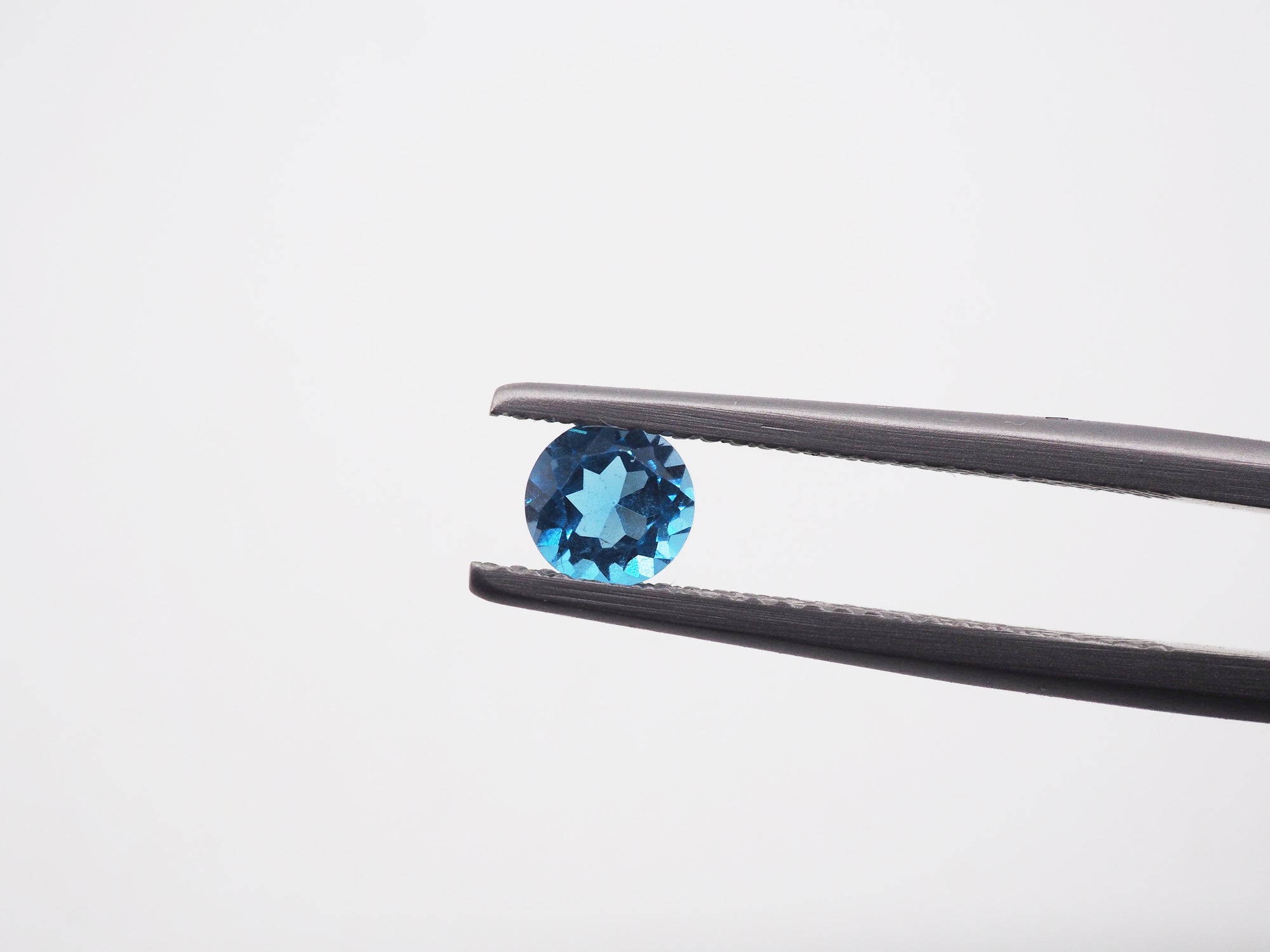 Blue Topaz matching Pair 5mm Approximately 0.98 Carat