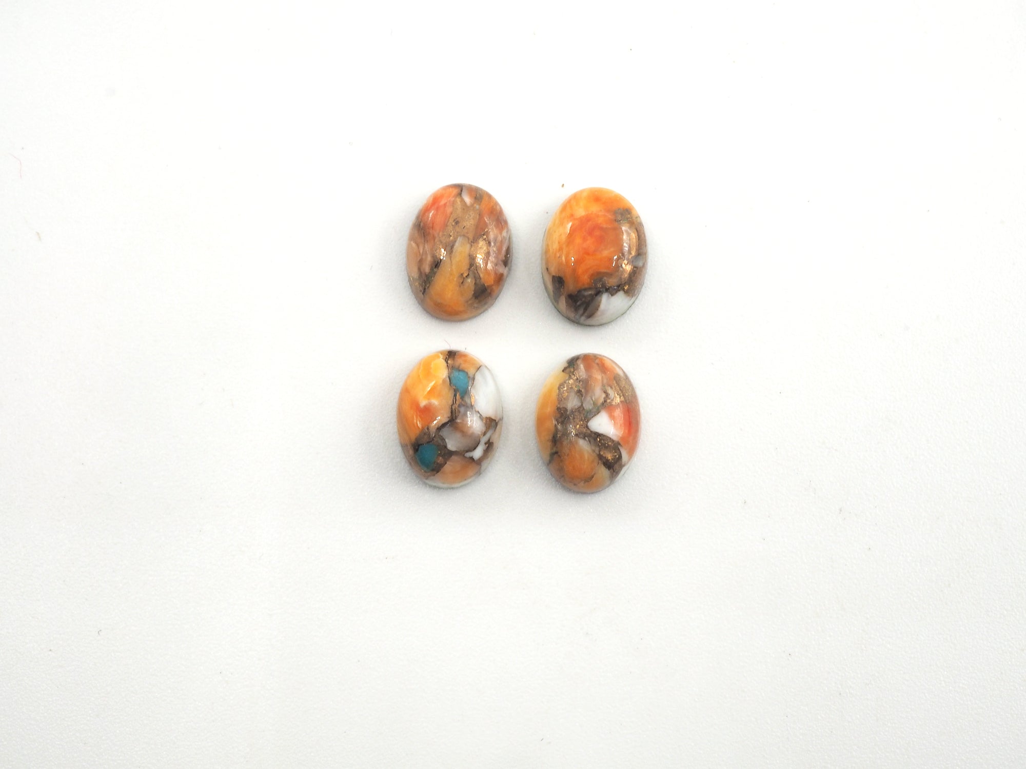 Oyster Copper Turquoise Cabs Oval 9x7mm Approximately 8.7 Carat