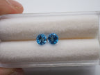 Blue Topaz matching Pair 5mm Approximately 0.98 Carat