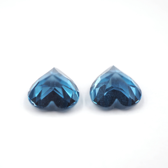 Blue Topaz Heart Shape 7mm Matching Pair Approximately 3.33 Carat