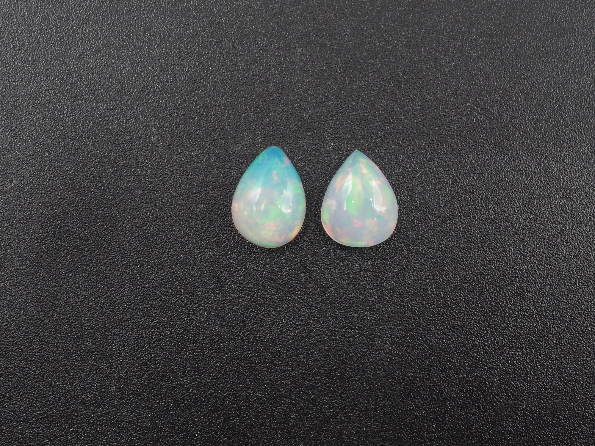 Ethiopian Opal Cabs Oval  9 x7 mm  Approximately 2.36 Carat , 2 Pieces