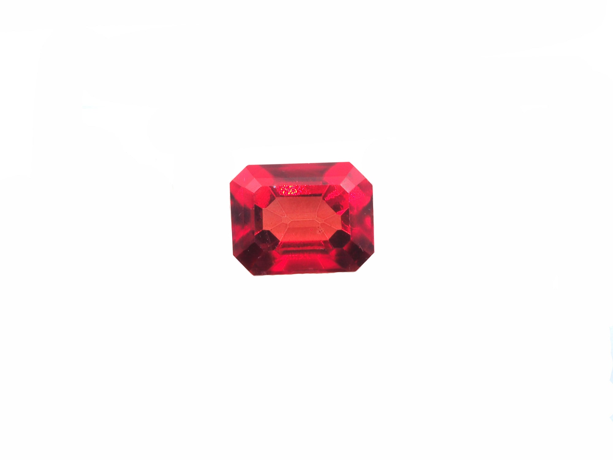 Red Topaz Emerald Cut 12.2x9.6mm Approximately 7.93 Carat
