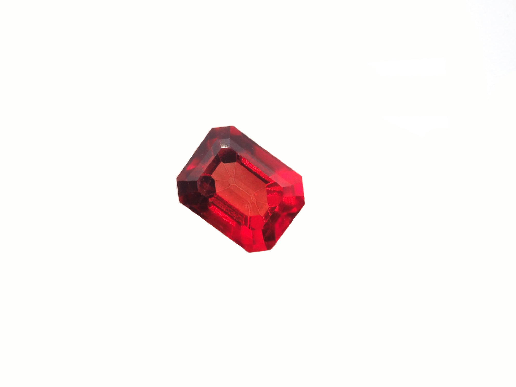 Red Topaz Emerald Cut 12.2x9.6mm Approximately 7.93 Carat