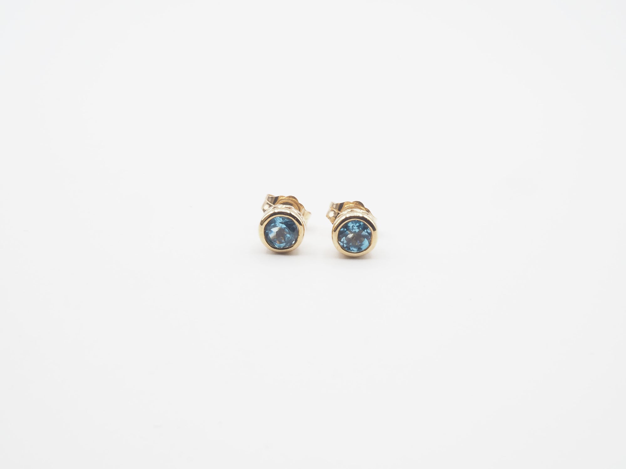 10K Yellow Gold Blue Topaz stud and Pendant