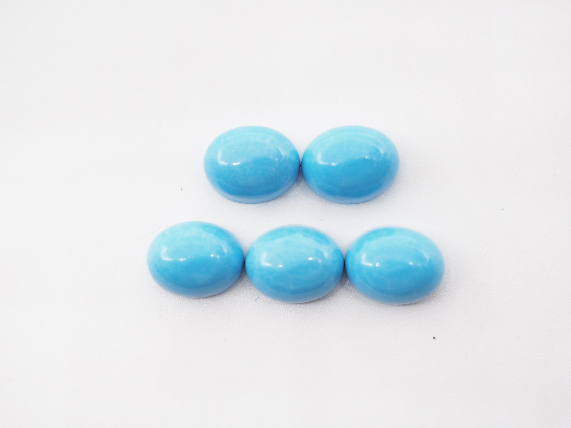 Blue Turquoise 10x8mm Oval shaped Approximately 12.15 Carat