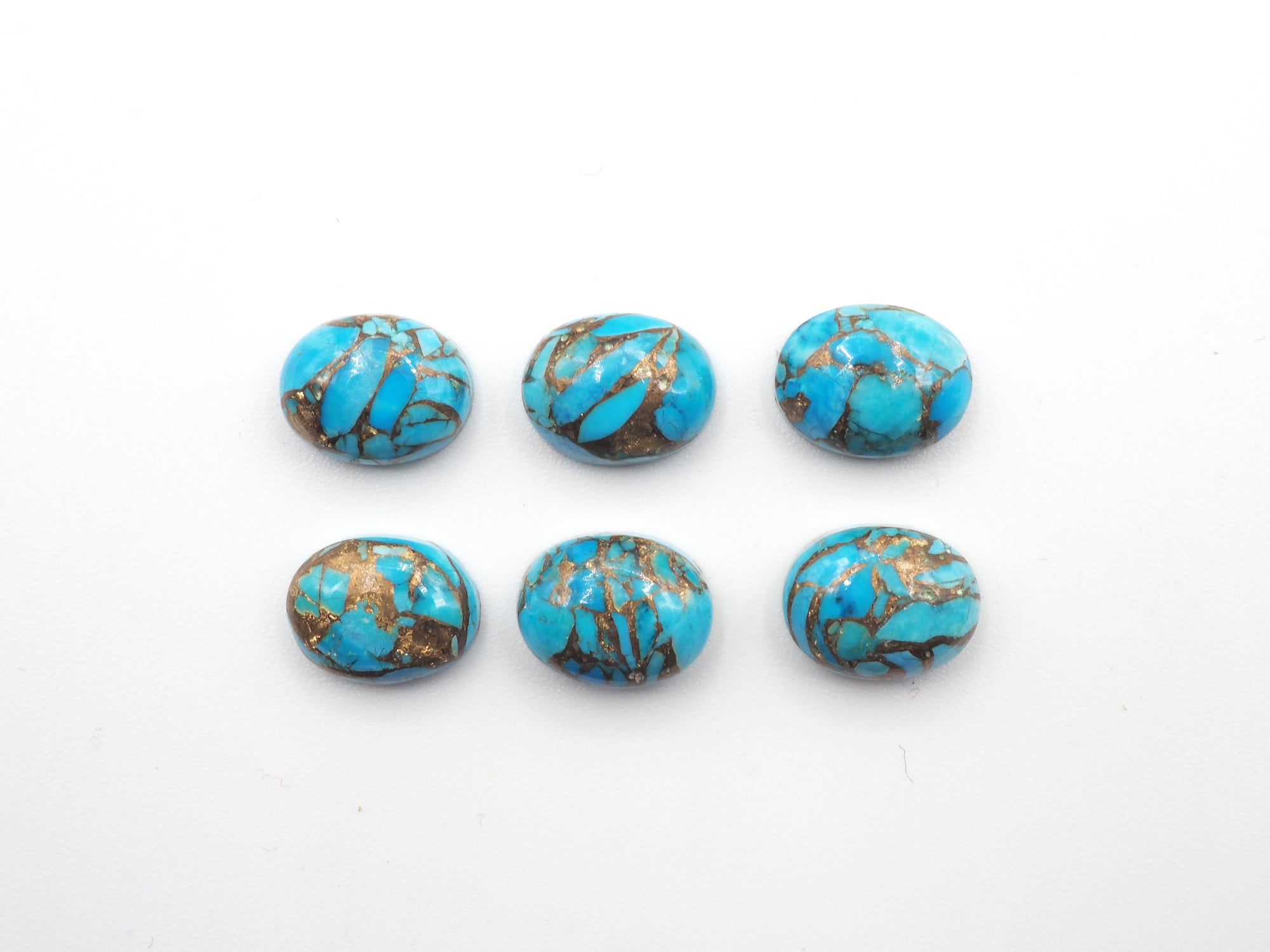 Blue Copper Turquoise Oval 9x7mm Approximately 12.09 Carat