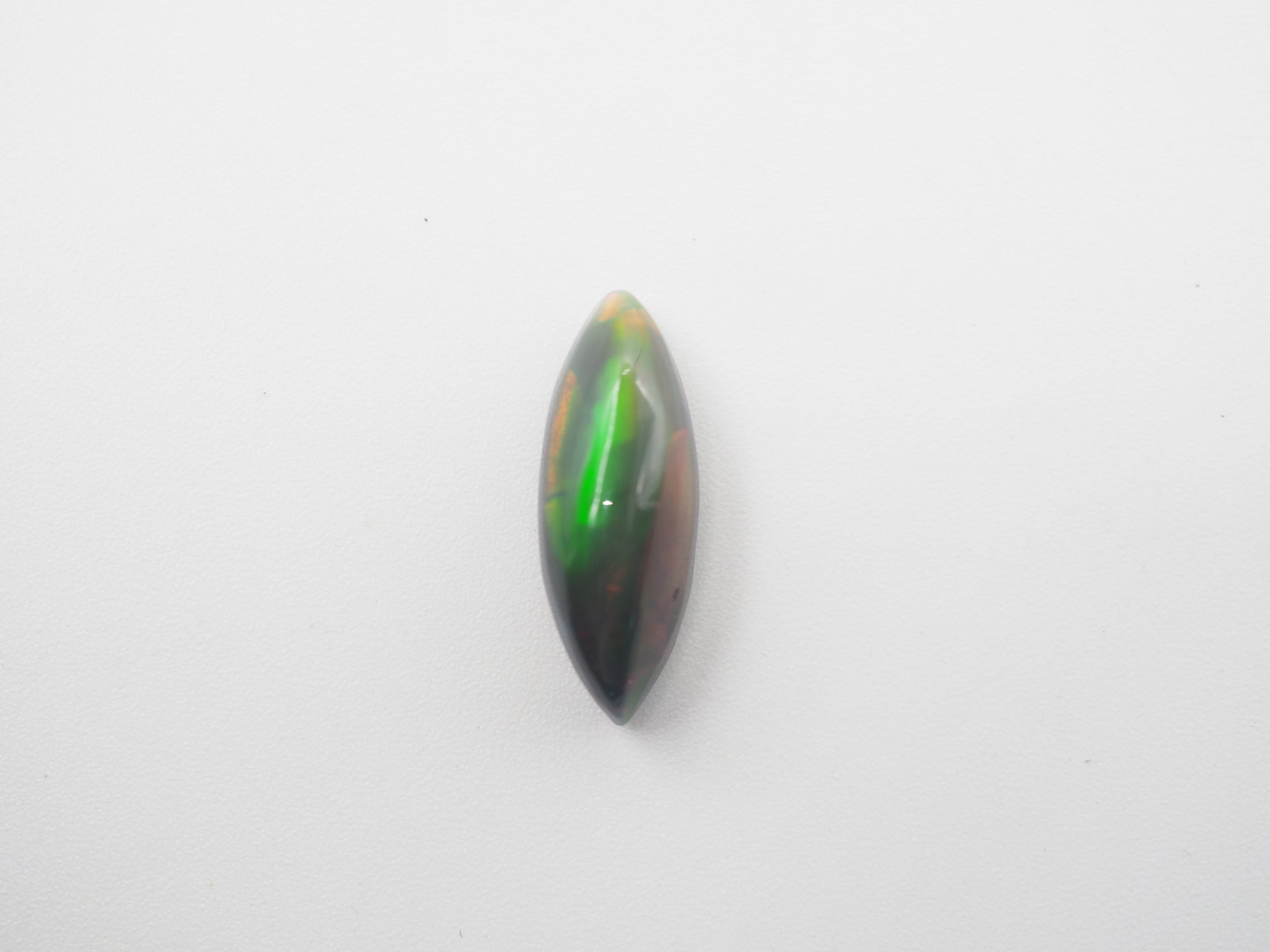 Ethiopian Black Opal 18.52x6.9x6.1mm Approximately 3.6 Carat