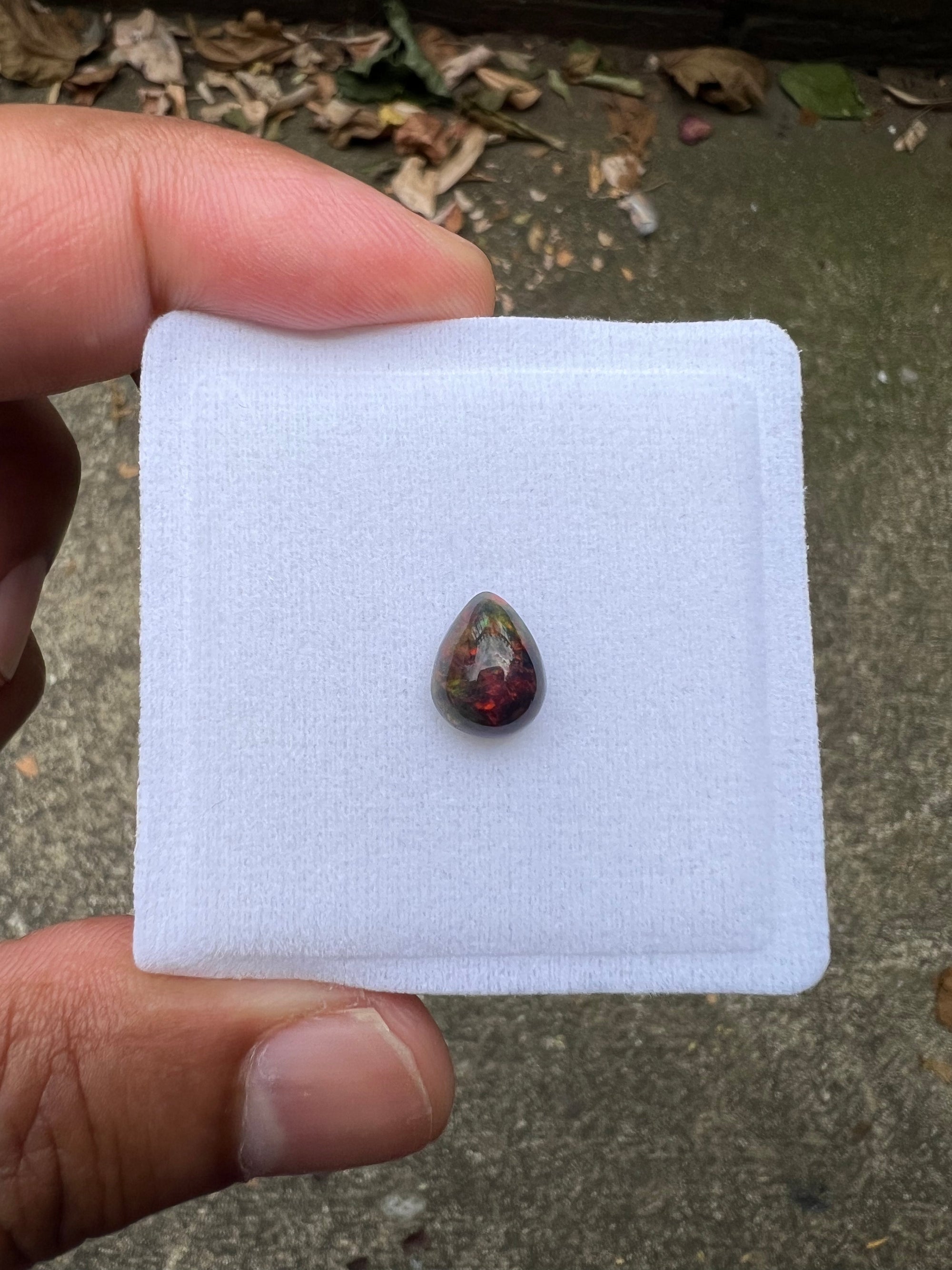 Ethiopian Black Opal 10.42x8.44x5.24mm Approximately 1.74 Carat