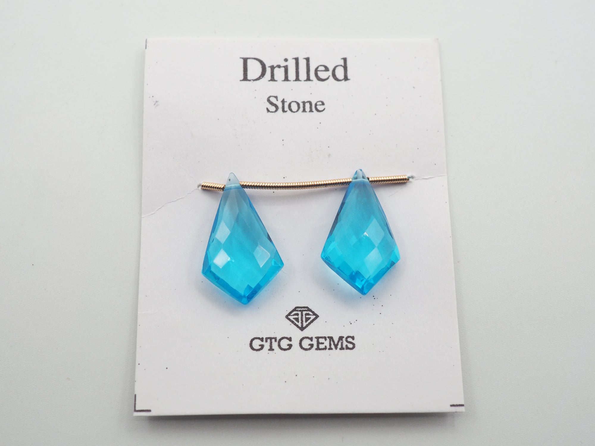 Hydro Drilled Faceted Blue Topaz Shield Shape  Approximately 13.5 Carat