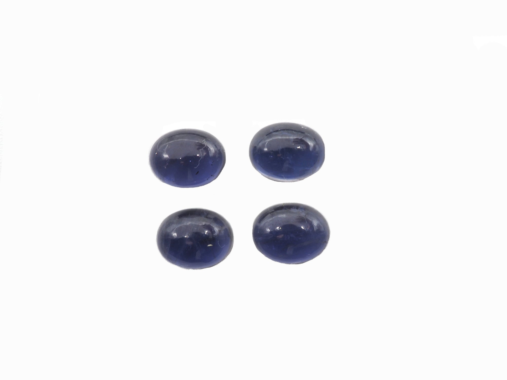 Iolite 9x7mm Oval Cabs Approximately 6.94 Carat