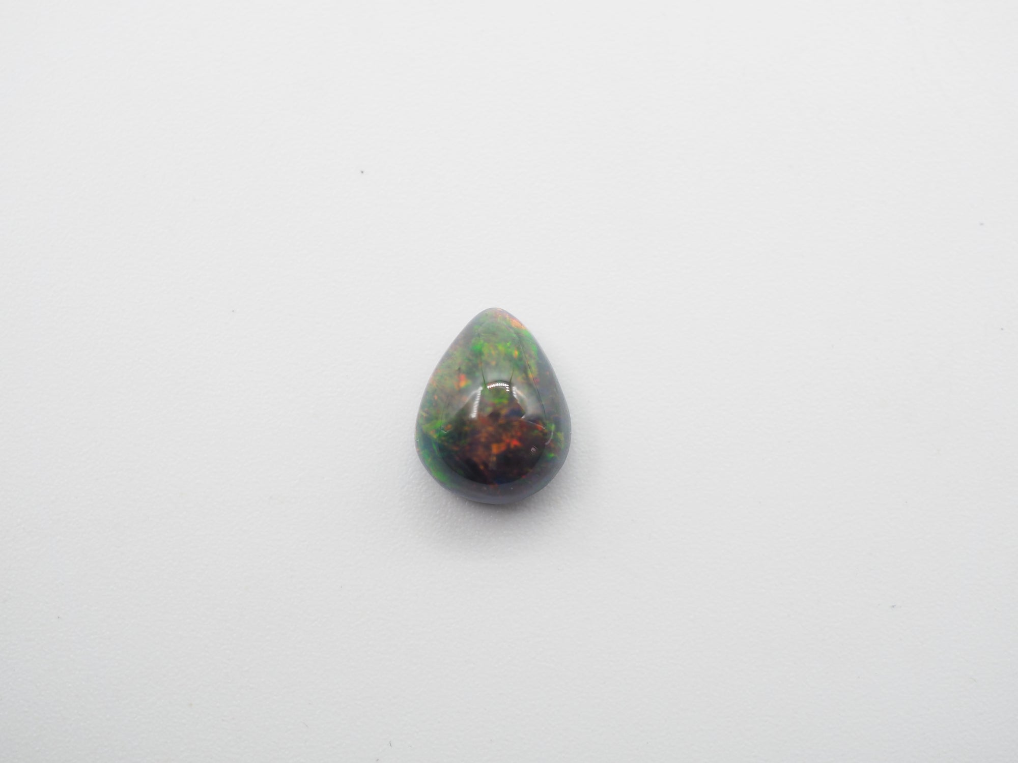 Ethiopian Black Opal 10.42x8.44x5.24mm Approximately 1.74 Carat