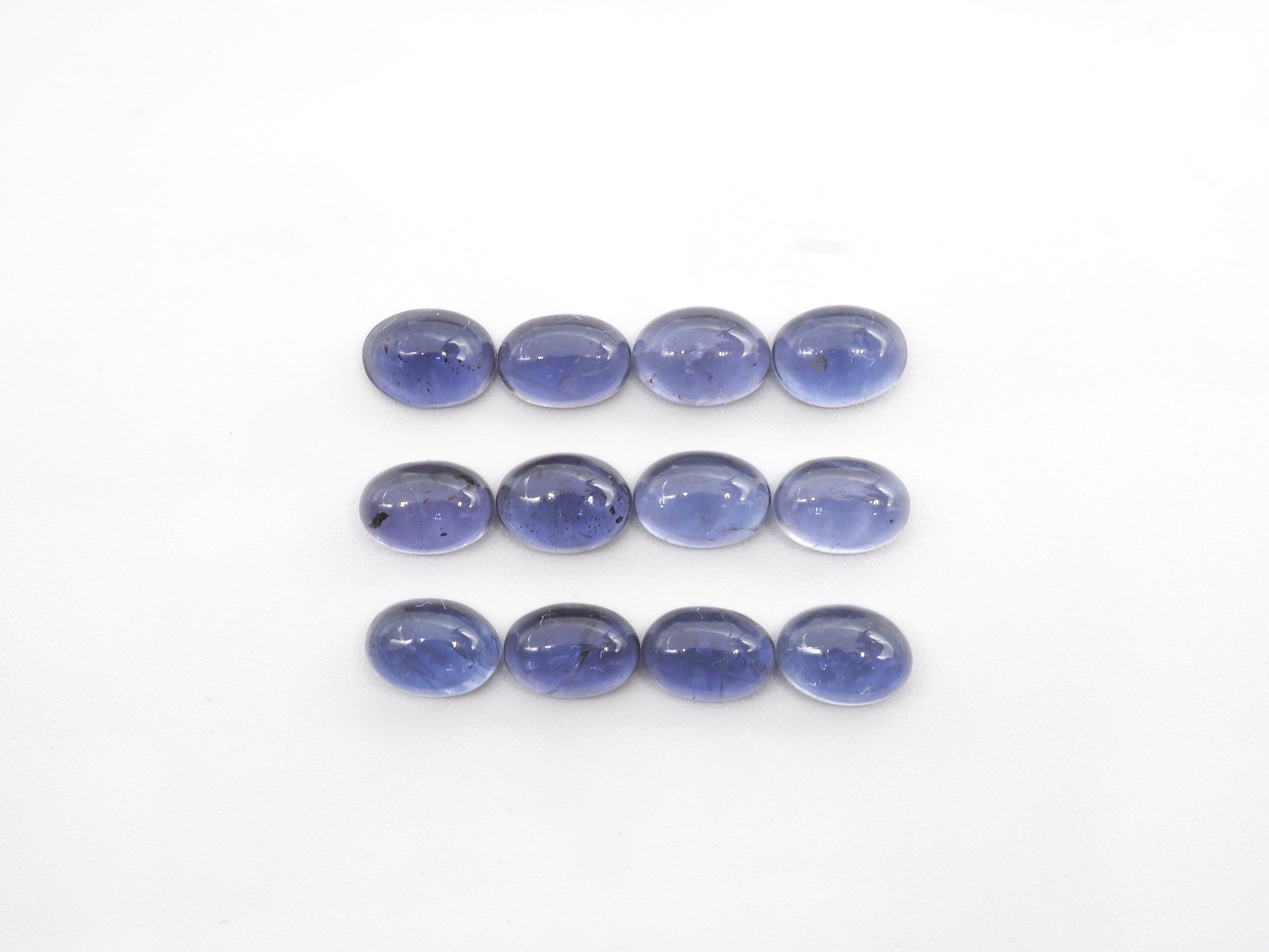 Iolite 7X5mm Oval Cabs Approximately  8.90 Carat
